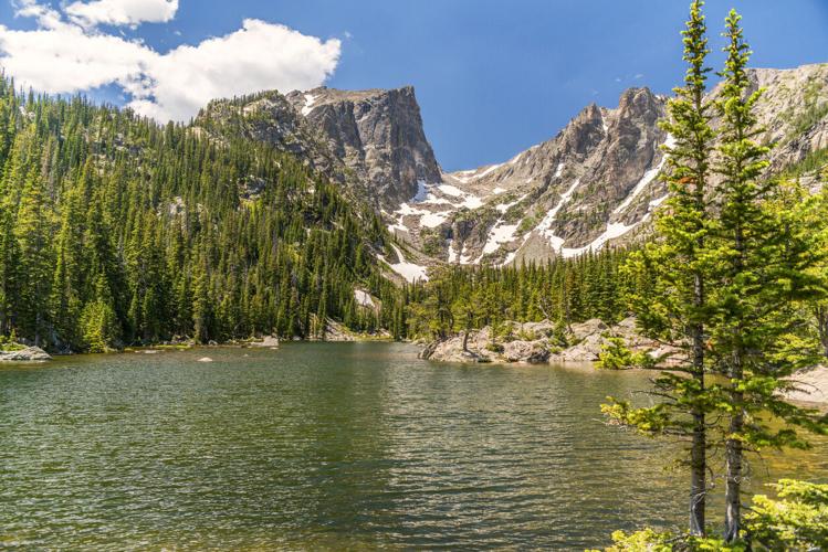 Hallett Peak is one of the most recognizable features of Rocky Mountain National Park, known for a distinct cliff face and for providing the stunning backdrop view at the heavily-trafficked Dream Lake site. Photo Credit: skibreck (iStock).