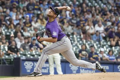 Brewers open six-game trip with loss to Rockies