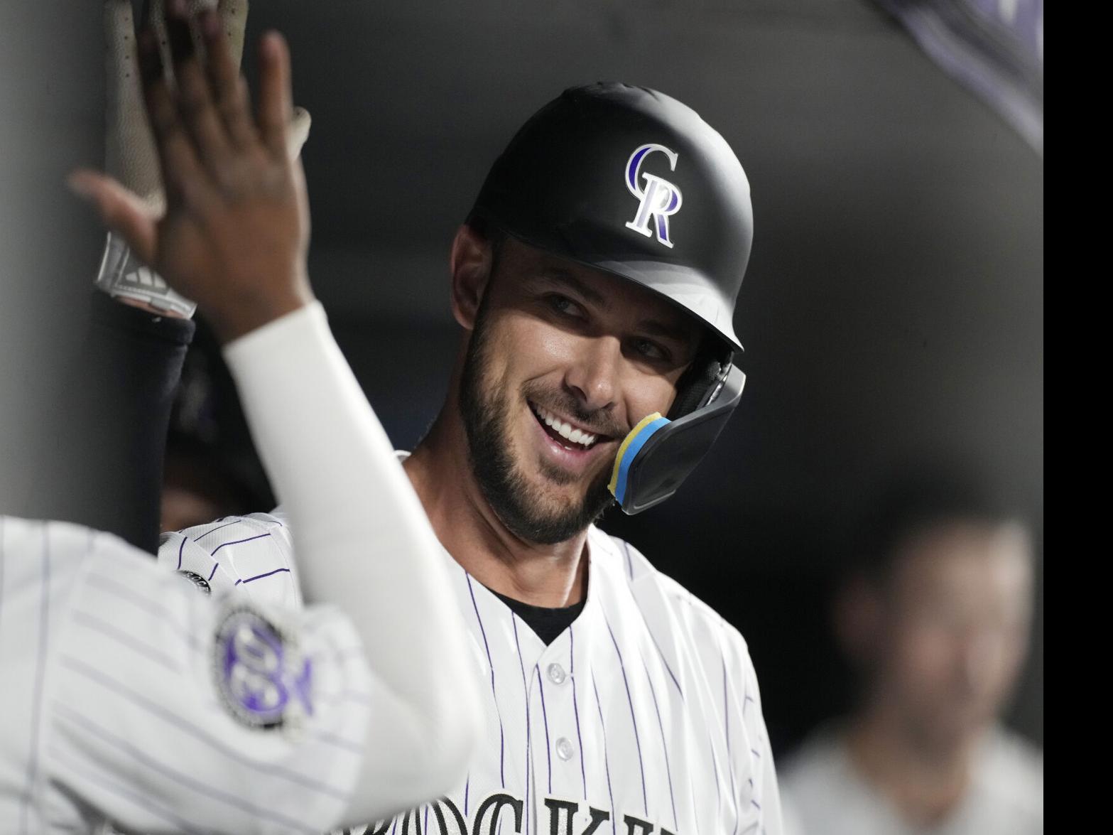 Colorado Rockies' Kris Bryant flips his bat in the air after striking out  against the Arizona Diamondbacks during the fourth inning of a baseball  game Tuesday, May 30, 2023, in Phoenix. (AP