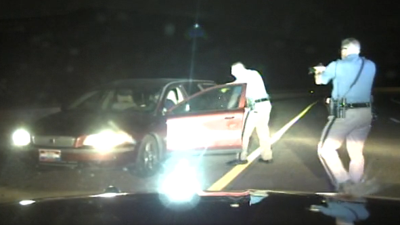 Video image of troopers with a man who fled a traffic stop