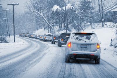Winter Driving in Snow Photo Credit: njw1224 (iStock).