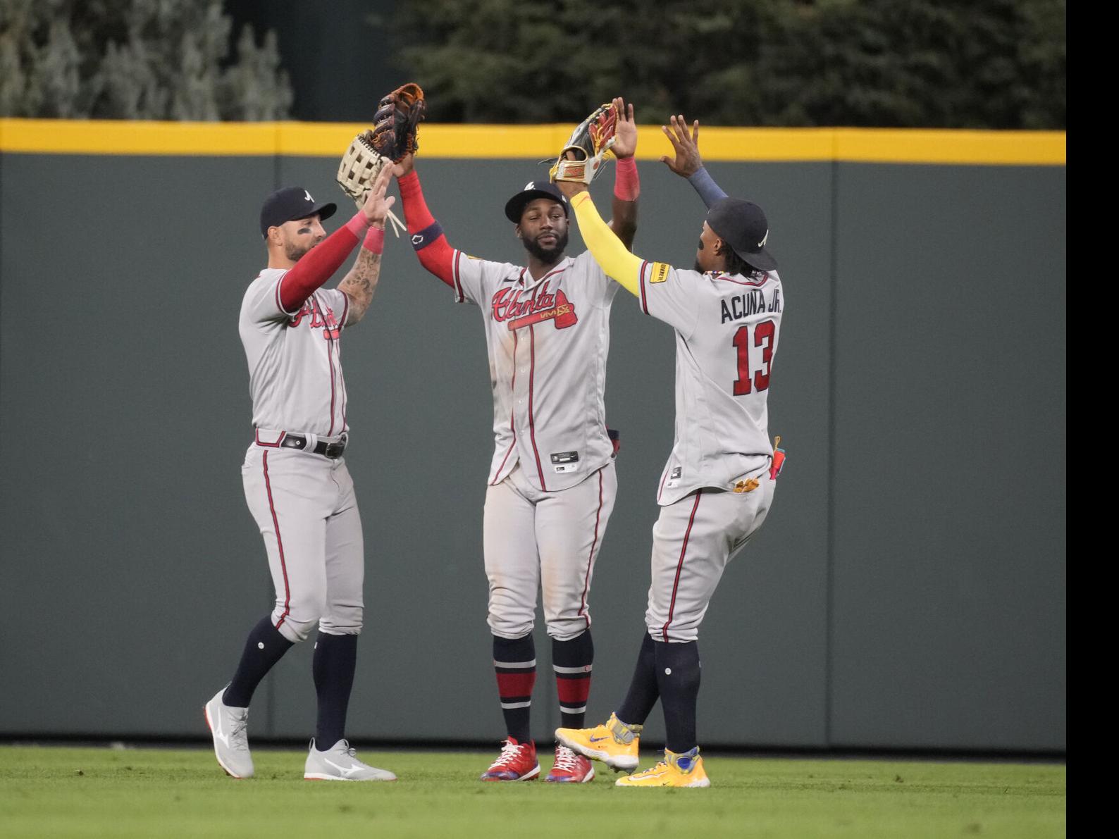 Braves' Ozzie Albies carried off field but X-rays bring good news
