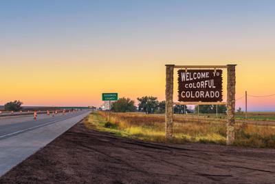 Welcome to colorful Colorado street sign along Interstate I-76 Photo Credit: miroslav_1 (iStock).