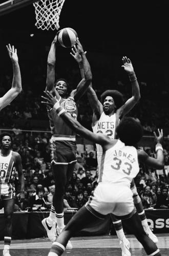 Covering Dr. J -- 5 years of love, playoffs and music in the air
