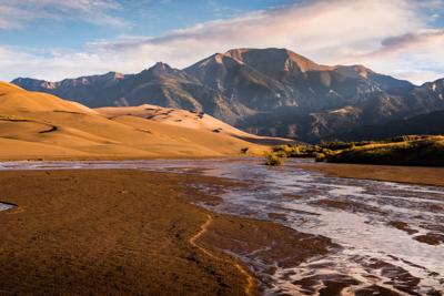 How did the Great Sand Dunes form and will they be gone anytime soon?