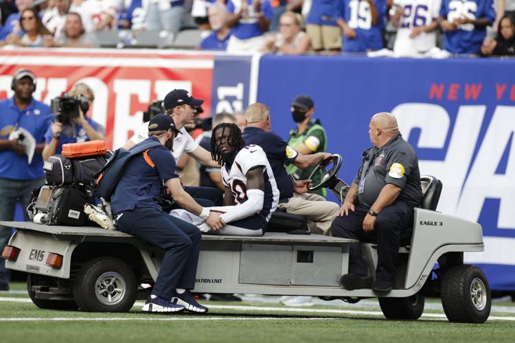 Broncos Giants Football Jeudy carted off