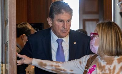 Manchin signals he is open to vote on social spending bill before the end of the year