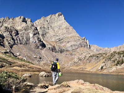 Spencer McKee looks up at Crestone Needle from the South Colony Lakes basin.