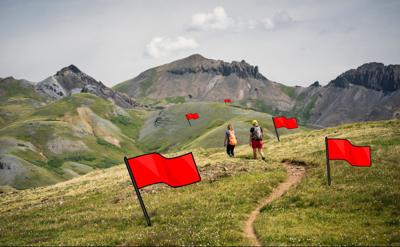 Photo Credit: wanderluster (iStock), flags added by OutThere Colorado.