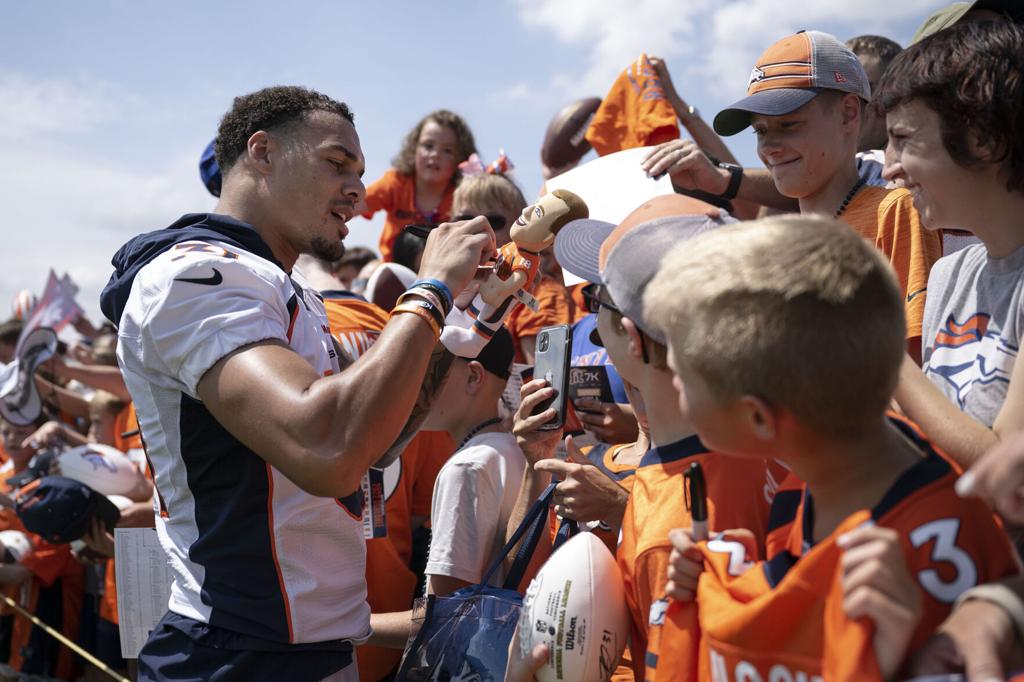 A day with Russell Wilson: Broncos star coaches kids, helps community with  foundation