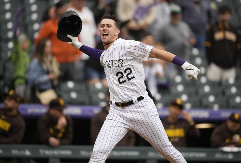 Rockies beat sloppy Red Sox 4-3 in 10 after rain delay - Newsday