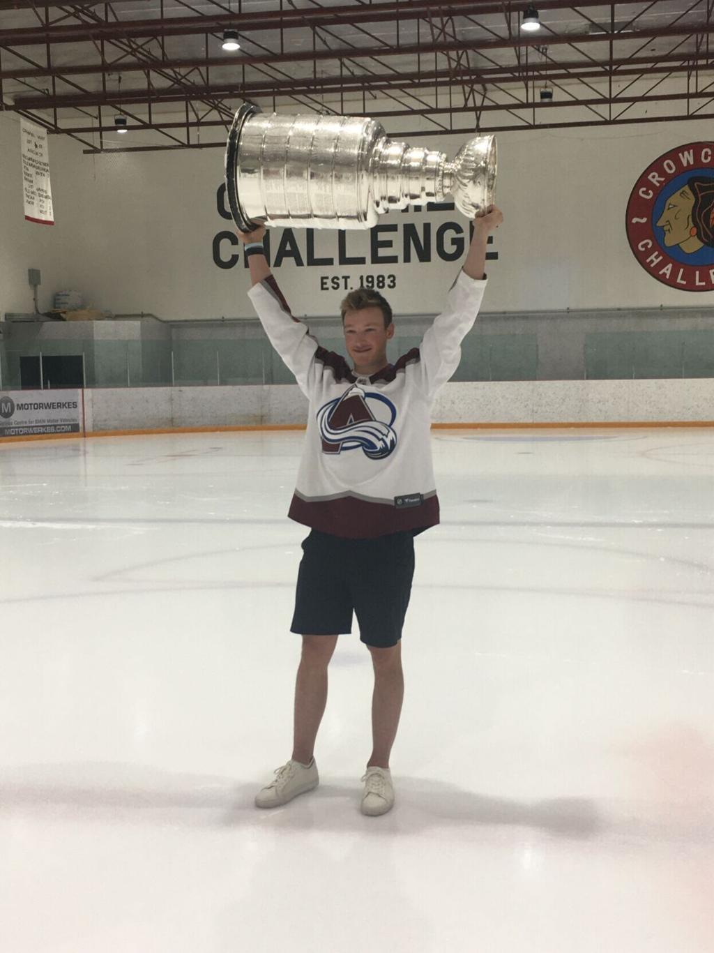 Calgary native Cale Makar raises Stanley Cup after dominant NHL