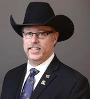 Colorado auctioneer biding time until crowds return | Lives Left Behind
