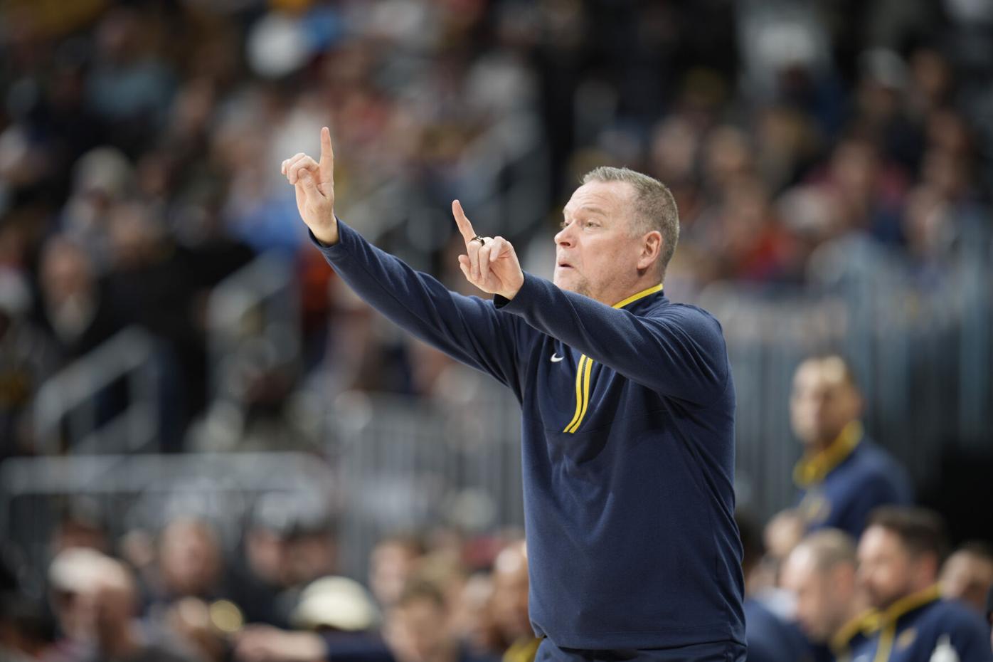 Denver Nuggets coach Michael Malone completes stunning journey to