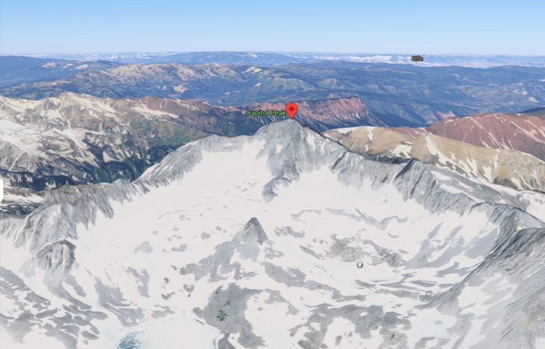 This image shows a 3-D rendering of Capitol Peak, with the summit marked by the red icon. Below the summit (and slightly to the right), find a grey pin. This pin is on the Pierre Lakes location, which is where the search and rescue teams started their a...