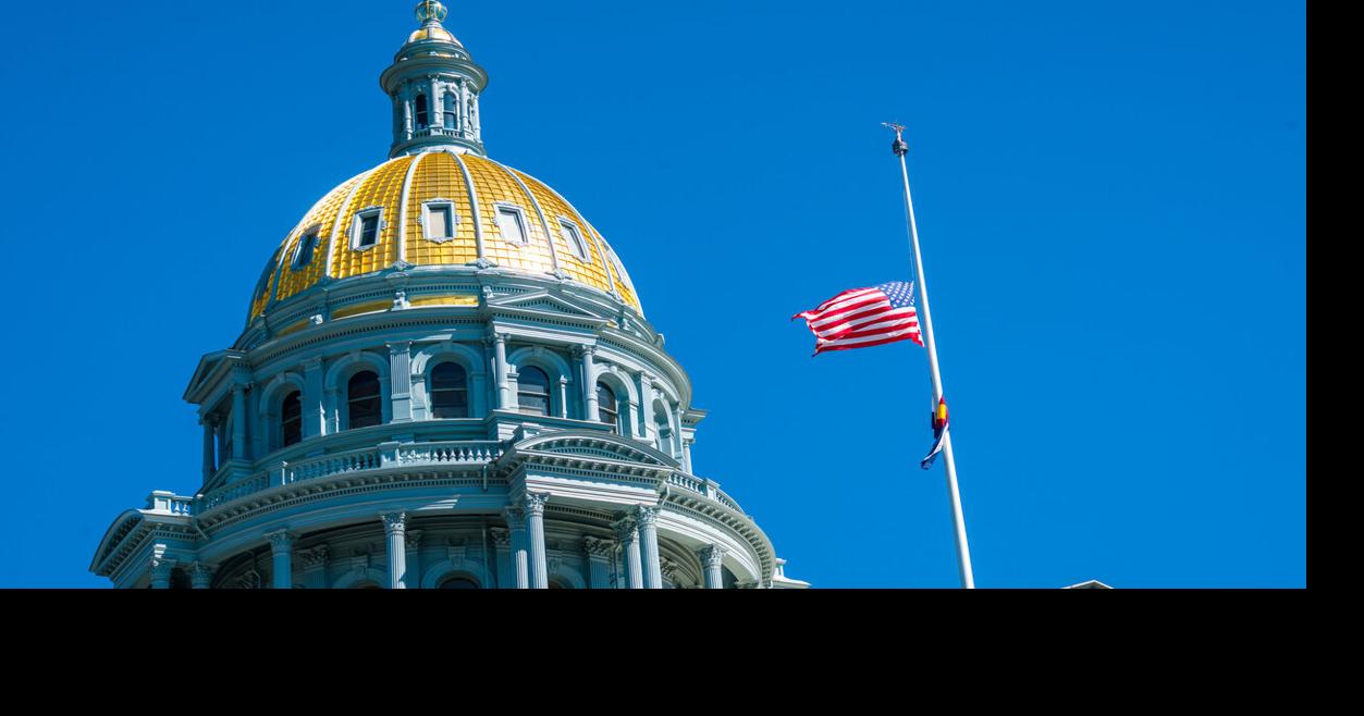 Why are flags at halfstaff in Colorado?