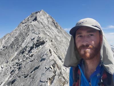 Dan Hobbs, 36, in front of the infamous Knife Edge section of Capitol Peak. Courtesy photo.