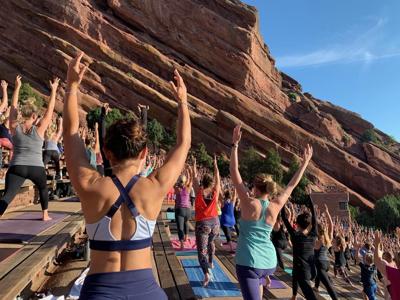 Yoga On The Rocks at Red Rocks Amphitheatre. Photo Credit: Breanna Sneeringer, OutThere Colorado.