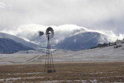 Windmill in the Clouds A windmill photographed on a cold winter day in the South Park valley of Colorado. Photo Credit: chapin31 (iStock).