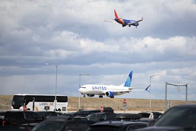 Planes depart and land at Denver International Airport (copy)