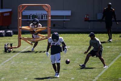 Denver Broncos running back Jaleel McLaughlin jukes, sprints