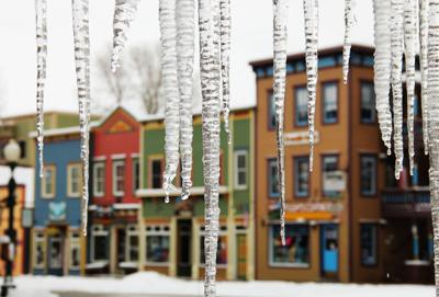Icicles in Colorful Colorado Town Photo Credit: PaytonVanGorp (iStock).