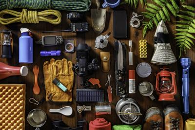 Top view camping and hiking travel and hiking gear Photo Credit: apomares (iStock).