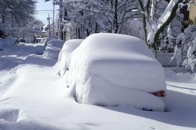 File photo cars covered in snow Photo Credit: bgwalker (iStock).