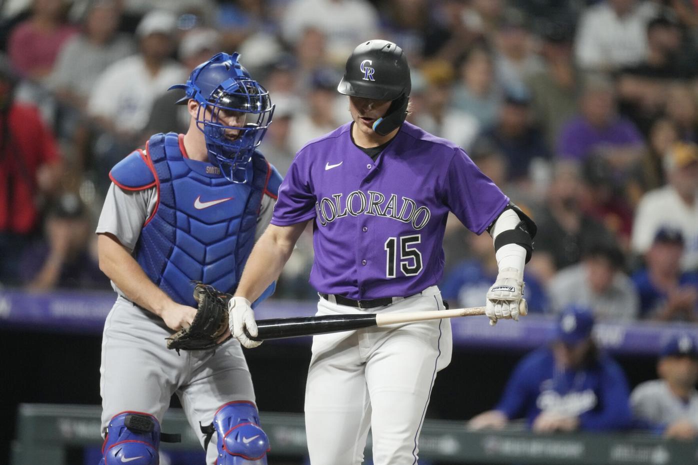 Dodgers split doubleheader, hand Rockies their 100th loss of