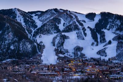 Aspen Colorado Town and Ski Slopes at Dusk Photo Credit: Adventure_Photo (iStock).