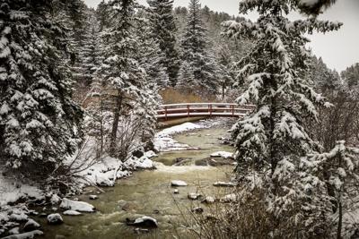Snow on a Bridge Photo Credit: Earth Trotter Photos (iStock).