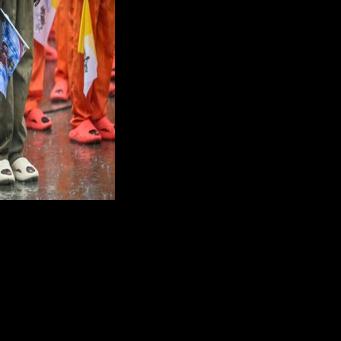 Fresh paint, careful choreography as pope visits African prison