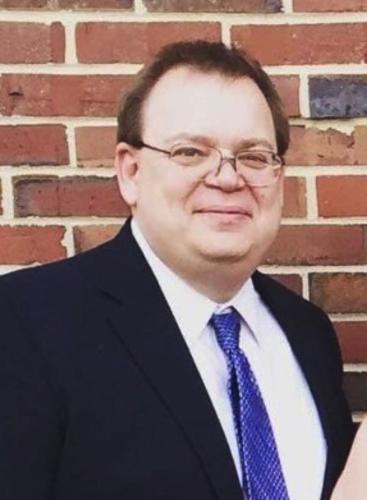 Perry gym court renamed for late principal Local News