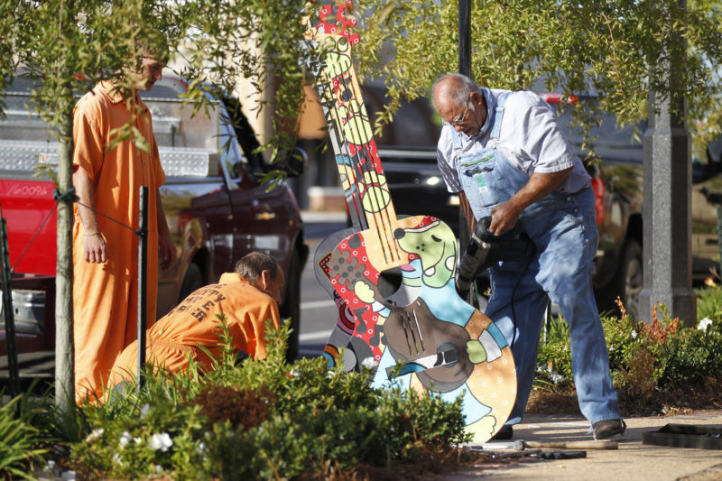 Iconic Elvis guitar statues reinstalled downtown News