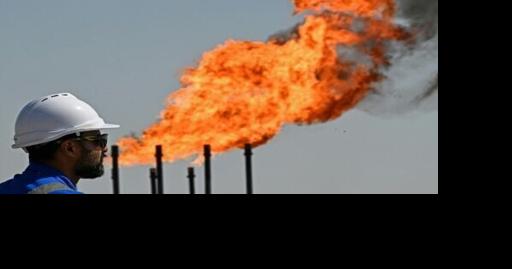 Oil slumps after hitting peak, US indices reach new records