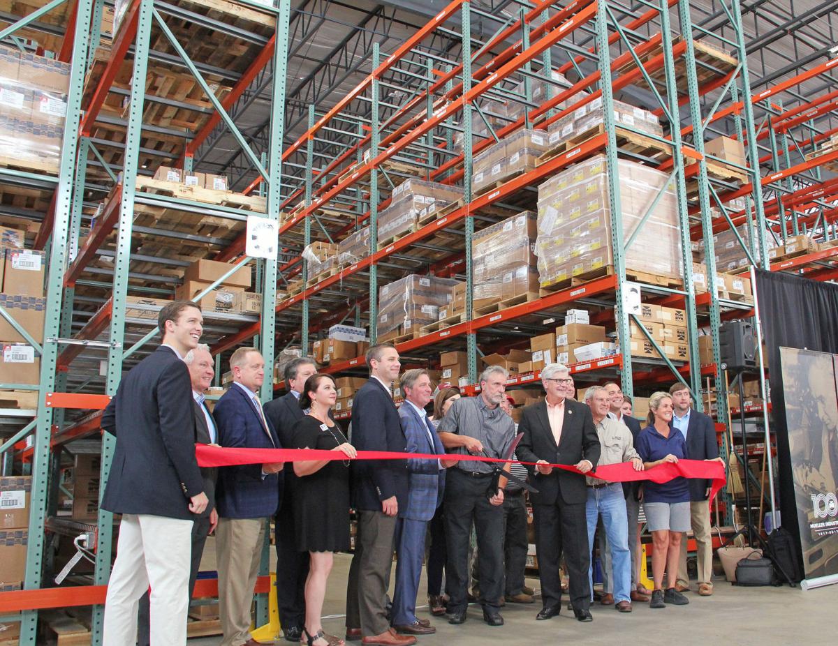 State, local officials cut ribbon on Mueller warehouse in Fulton
