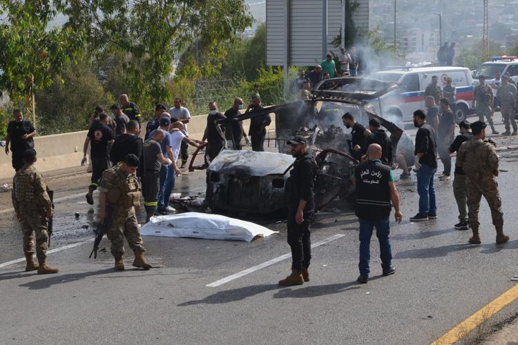 Israeli drone strikes on vehicles in Lebanon kill 12 people, including 2 children