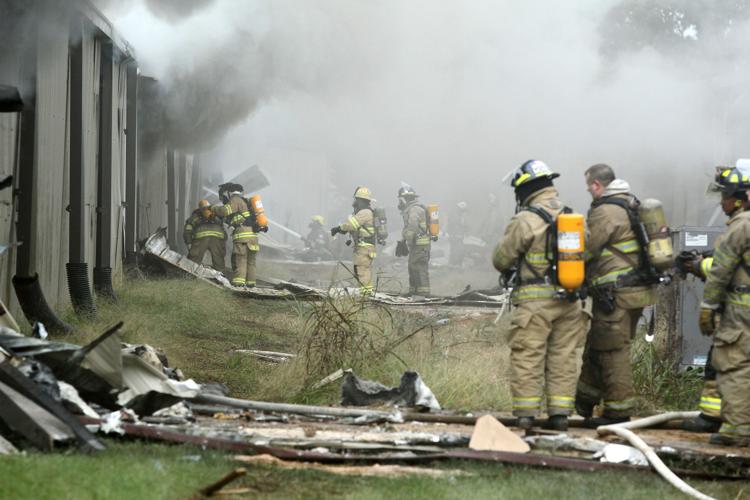 Arson suspected in American Furniture fire, 15,000 reward offered