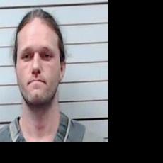 Mooreville man held on charge of molesting a minor