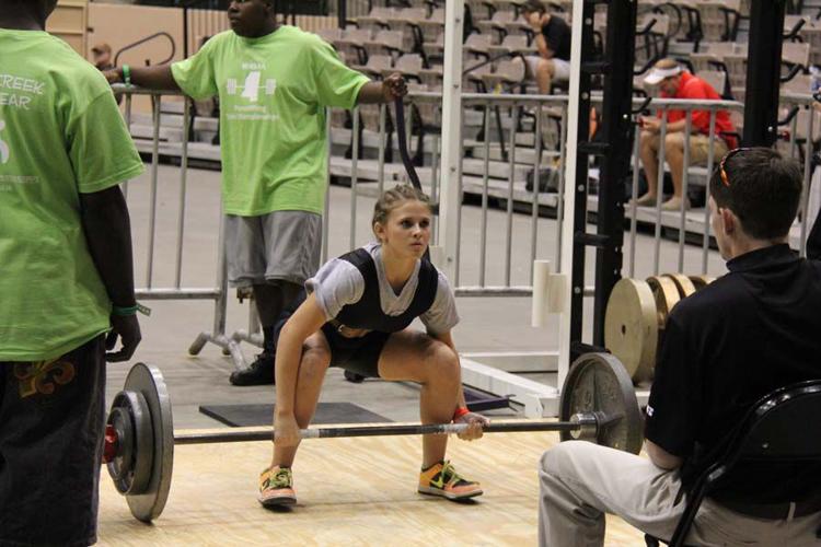 Hand, Simmons win state powerlifting titles