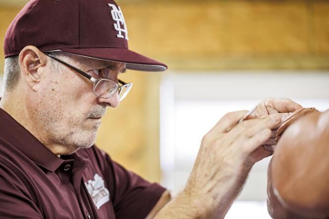 MSU unveils statues of Clark, Palmeiro as part of weekend