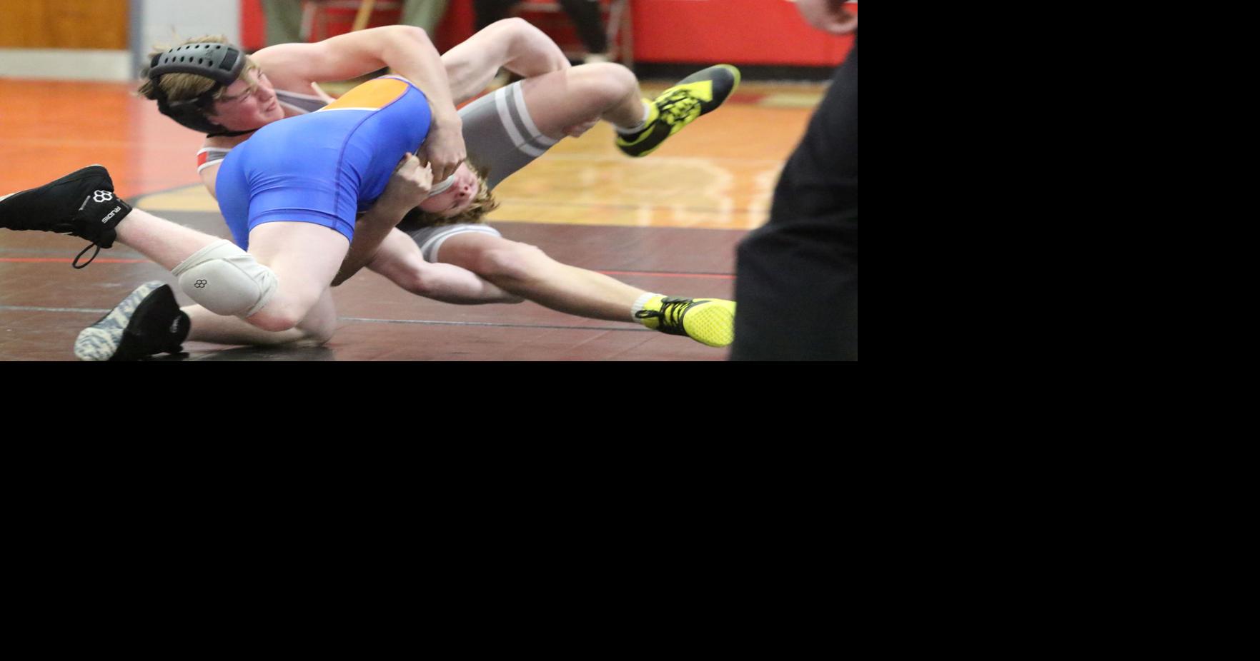 North and South grapple in wrestling