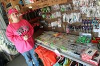 Teenage bait shop owner hopes for the passion of fishing to catch