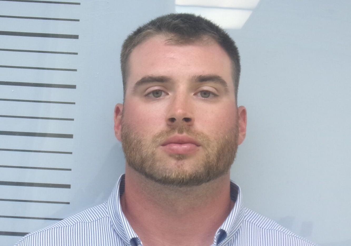 Former Booneville assistant basketball coach, player arrested on