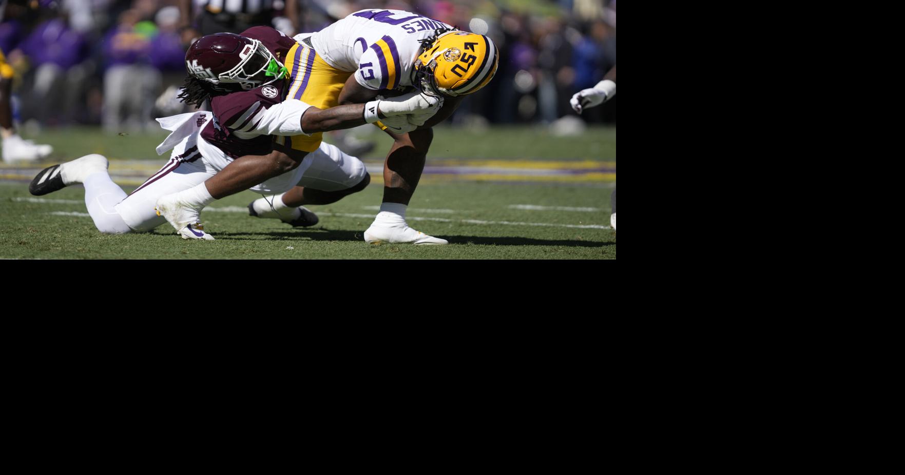 Mississippi State tackling LSU player | | djournal.com