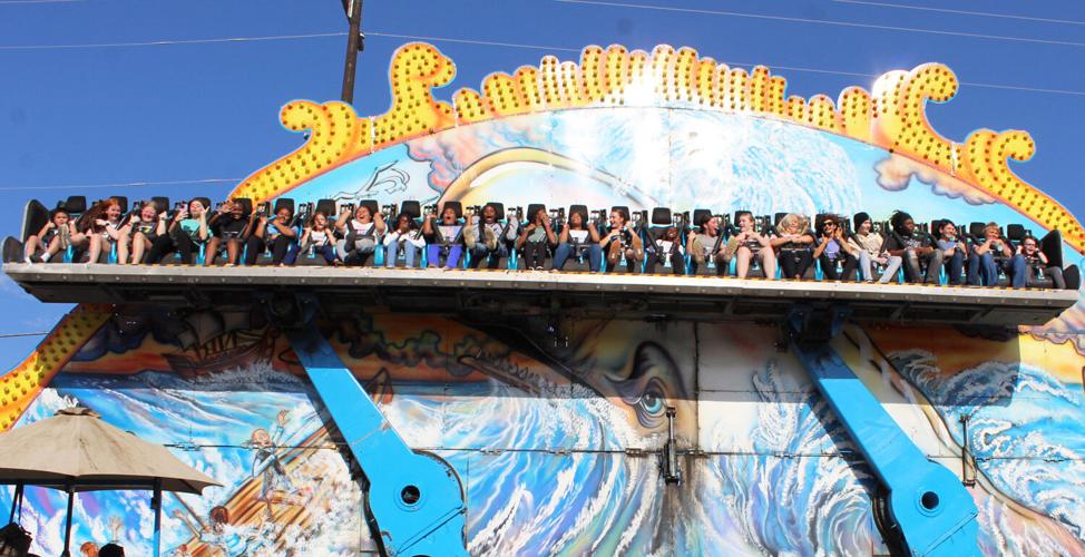 Moby Dick Ride Model Carnival offers thrill rides and plenty of chances to win prizes ...
