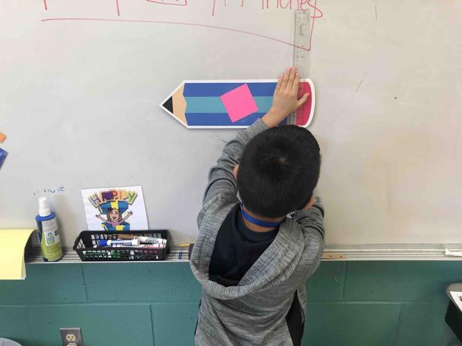 Students practice measuring around the classroom | Education | djournal.com