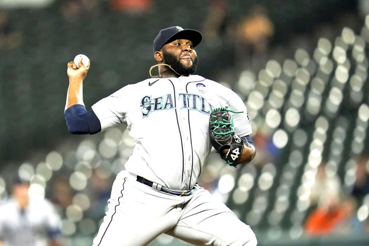 Castillo pitches into 7th in successful Seattle debut