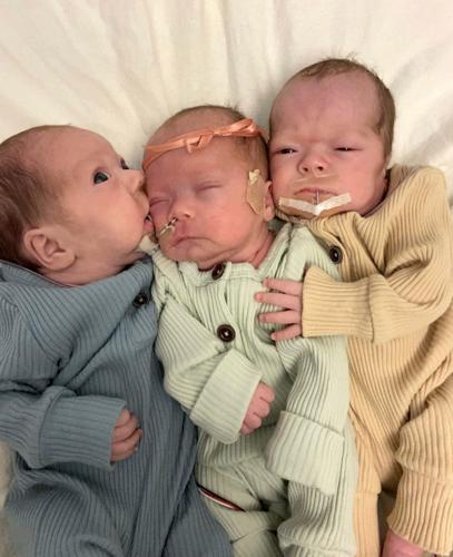 Off script, couple welcome triplets
