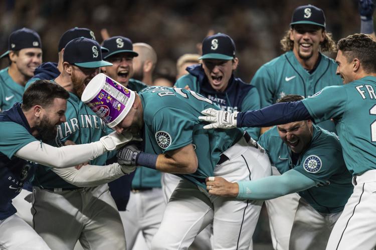 M's playoff drought ends on Raleigh's walk-off HR, Sports